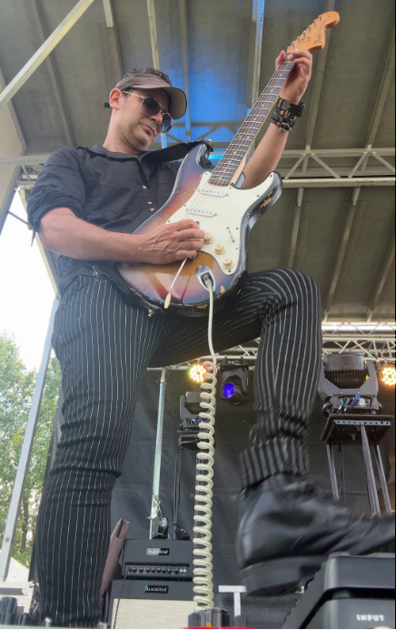 Marc of CAKEMIX playing guitar July 12, 2025