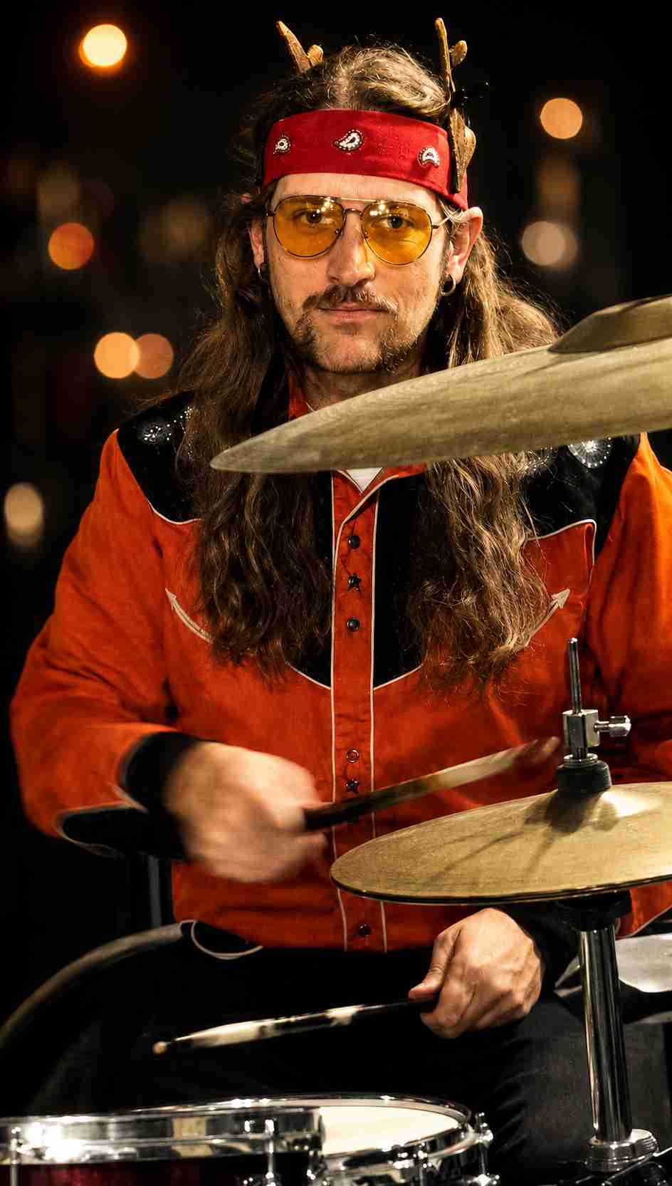 Kyle of CAKEMIX playing the drums